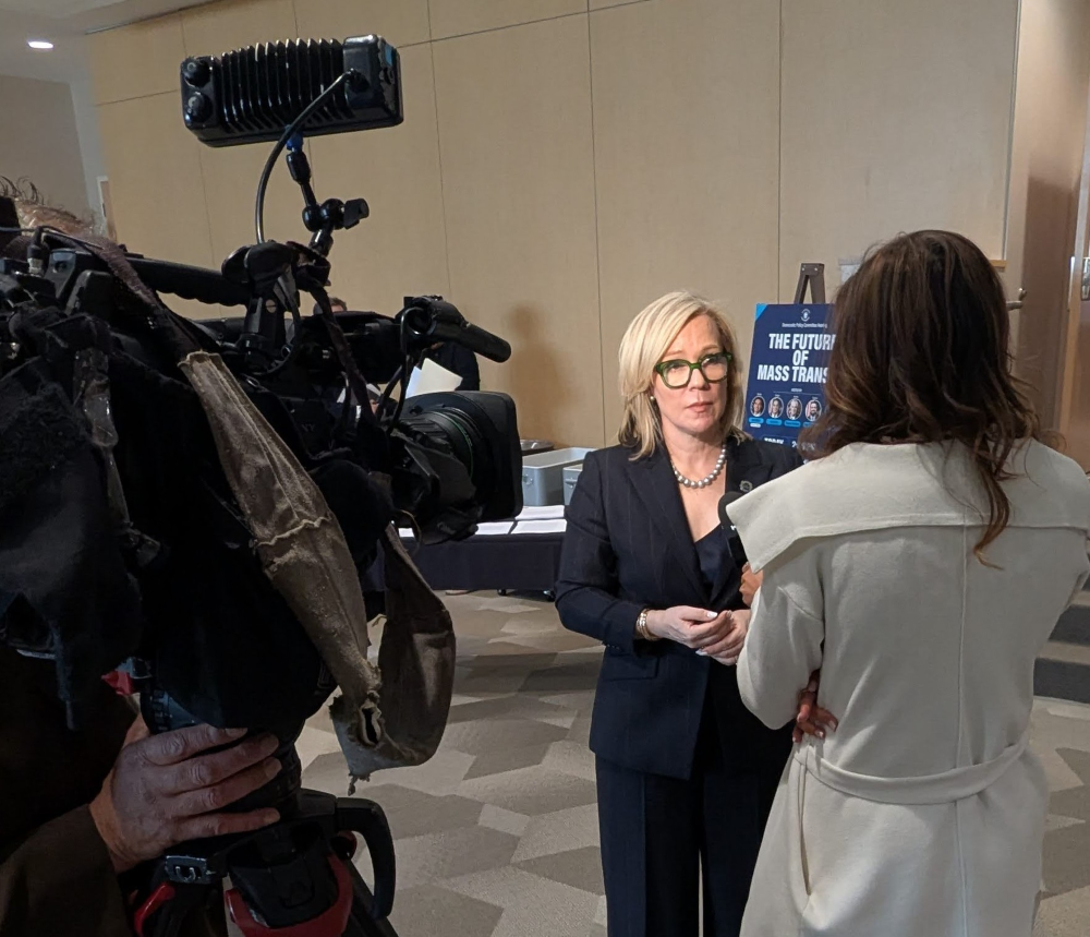 PRT CEO Katharine Kelleman being interviewed by a TV reporter